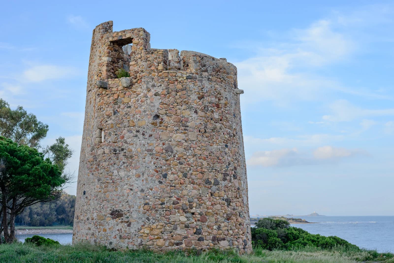 The old stone watchtower at Cala d'Ostia on the coast at Pula in southern Sardinia