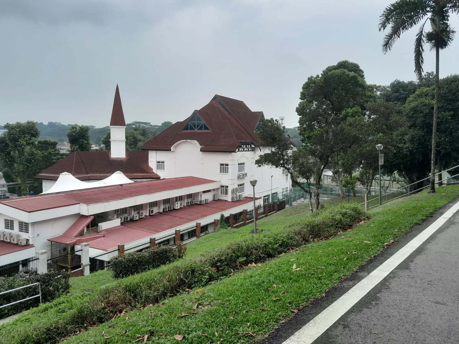 A low community building surrounded by trees in the Tanglin district of Singapore