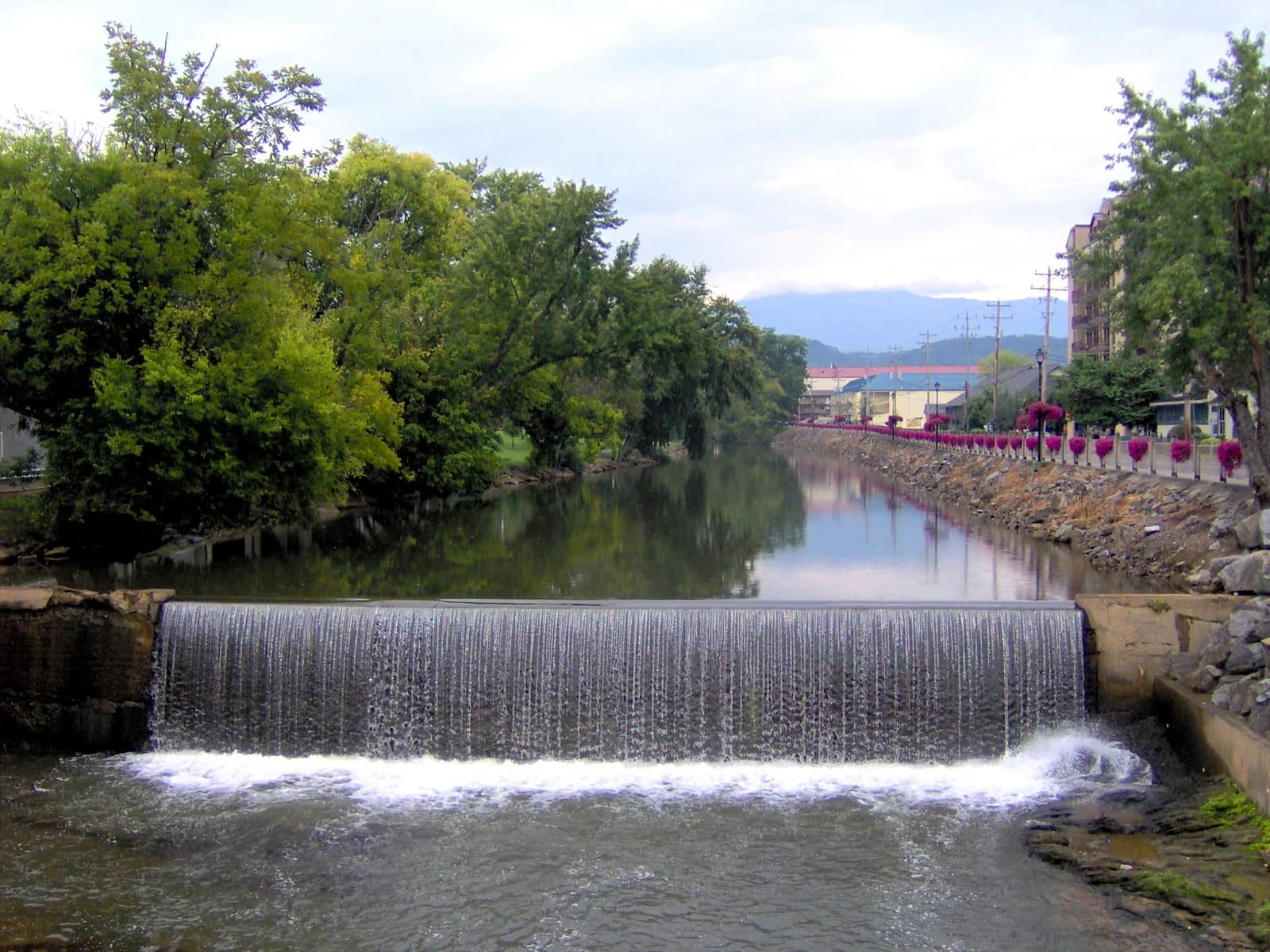 The mill dam weir on the Little Pigeon River running through the middle of Pigeon Forge