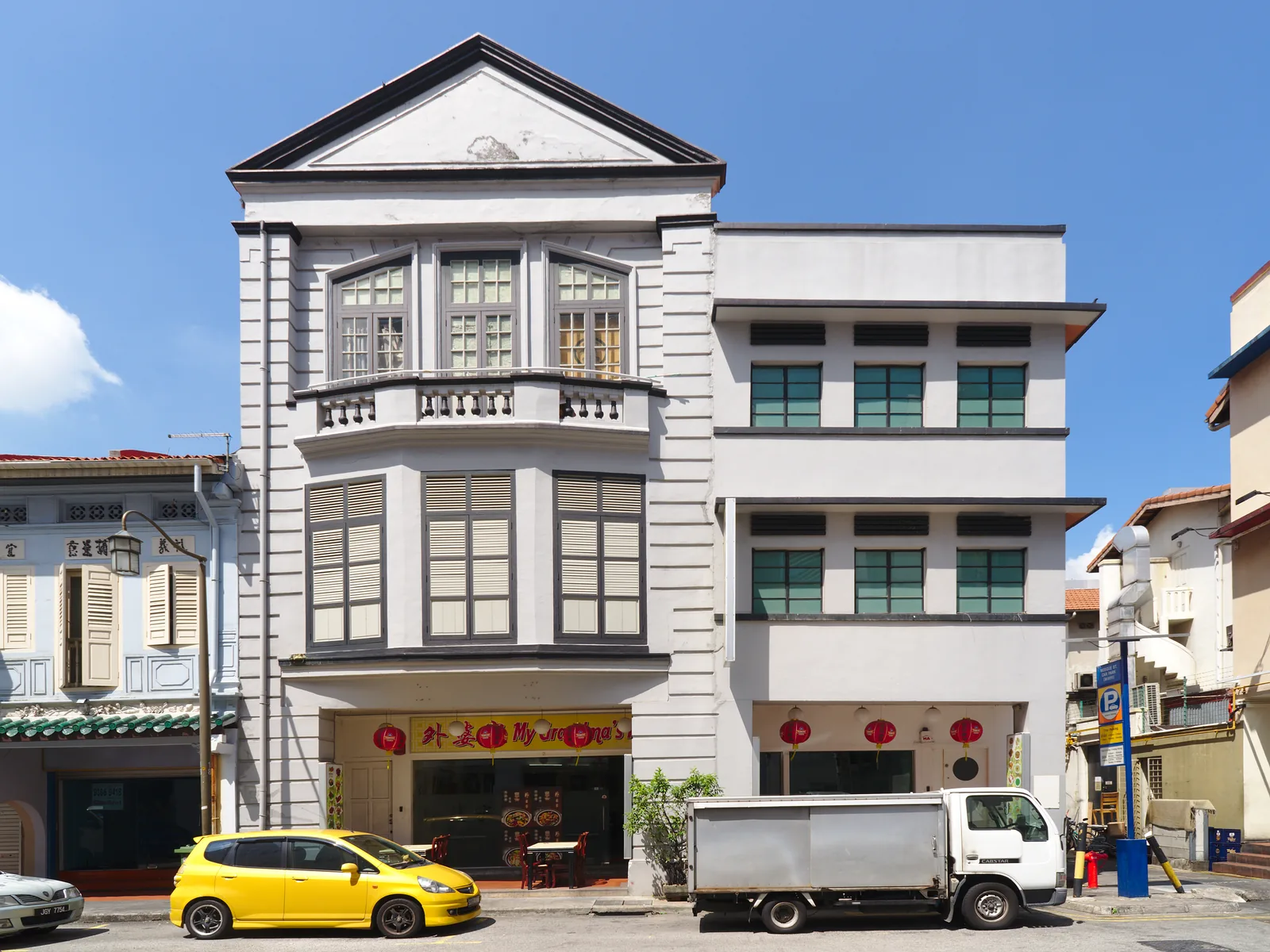 Restored shophouses in Chinatown, Singapore, the central blocks where most of the city's family rooms sit