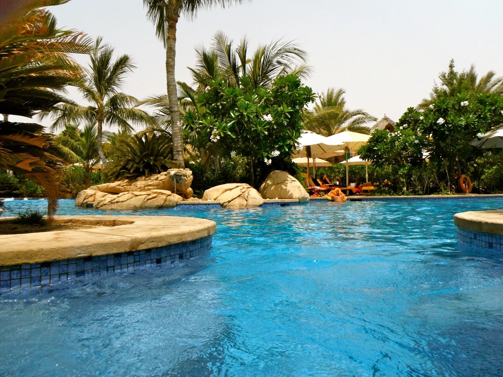 The sand and shallow water at Jumeirah Beach in Dubai