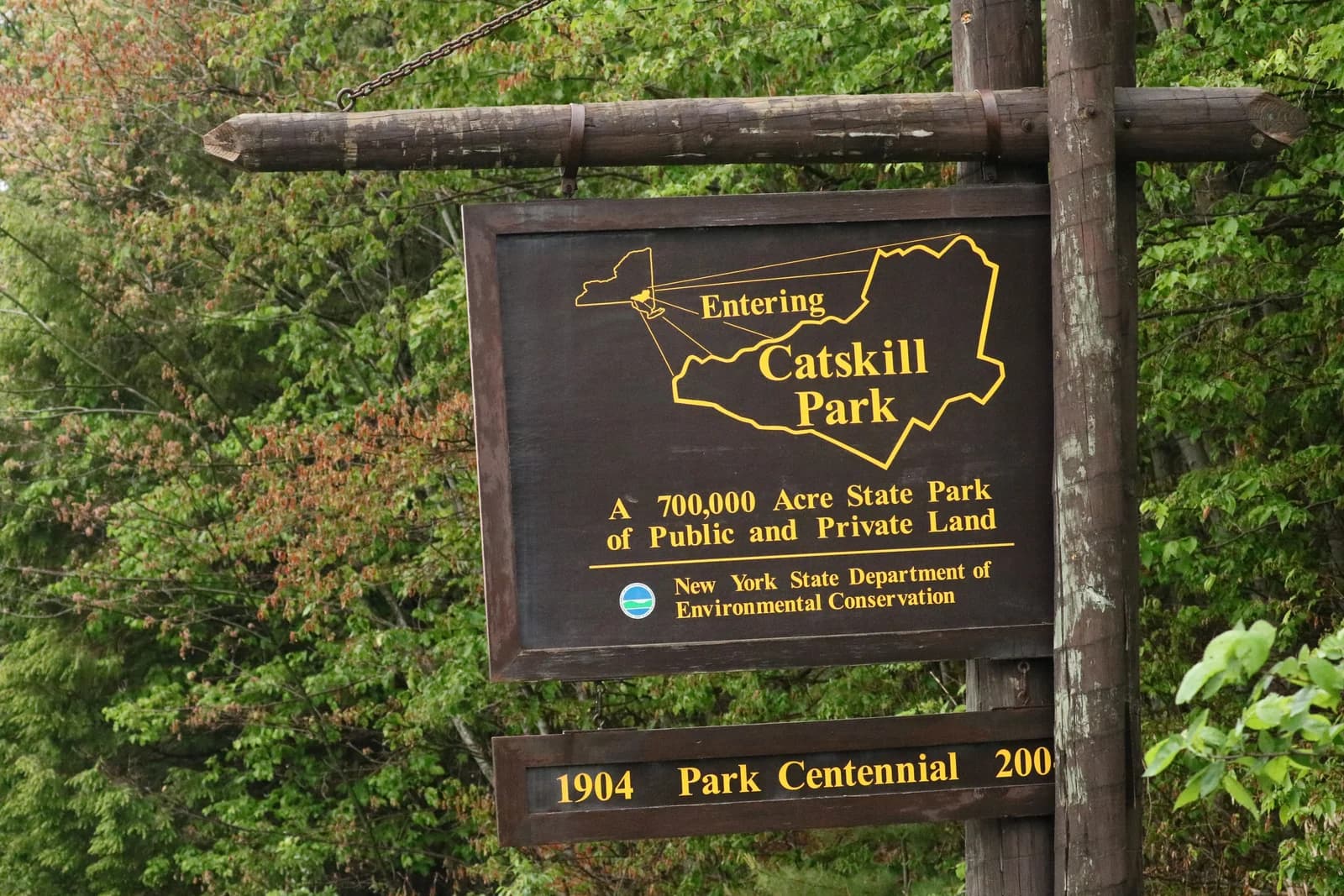 A Catskill Park boundary sign beside New York State Route 23