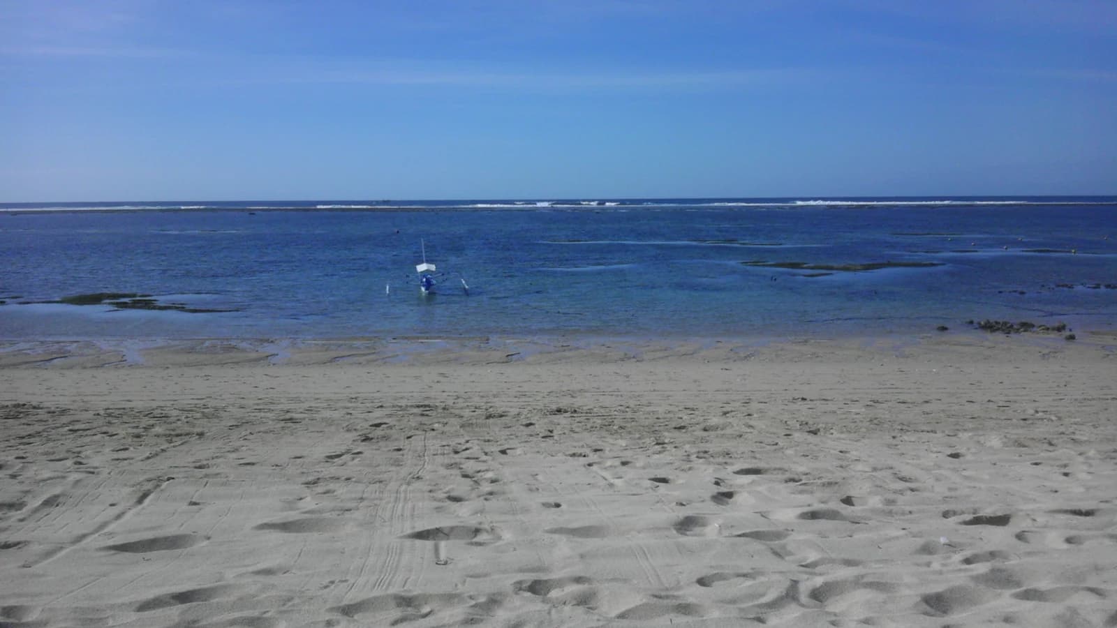 The shallow reef flat off Nusa Dua beach in Bali, where most of the island's large family resorts stand