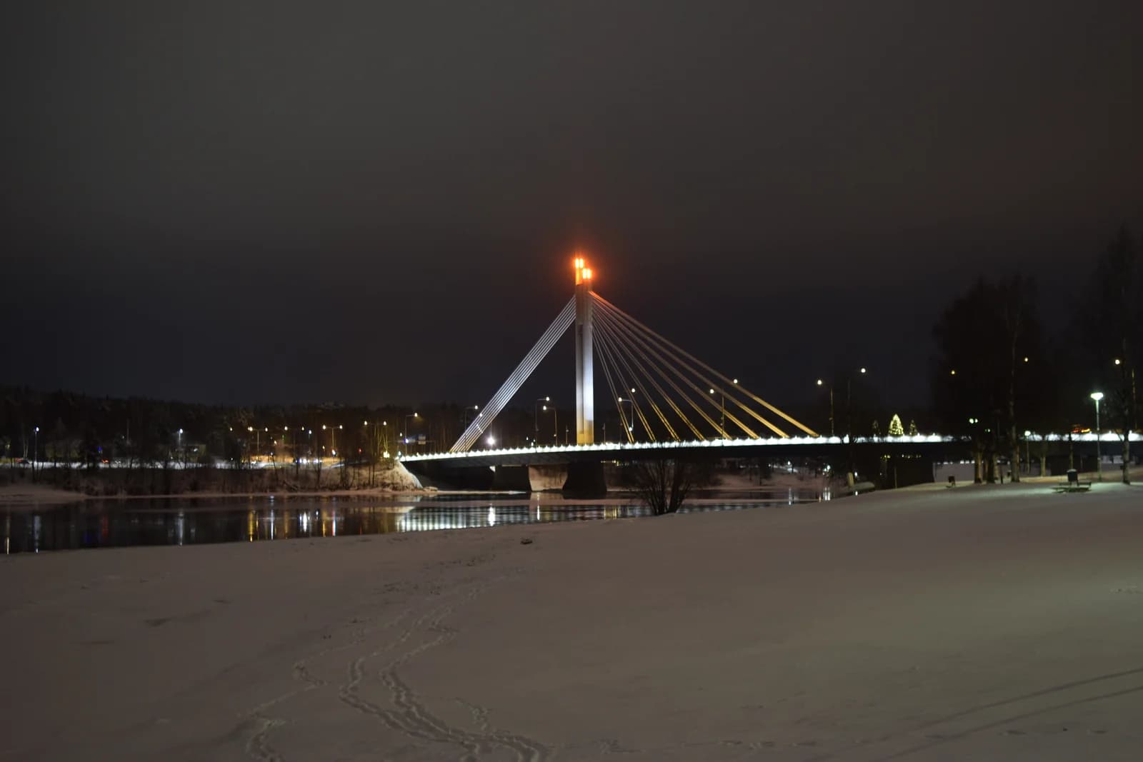 The Lumberjack's Candle Bridge at Rovaniemi carrying its road across the Kemijoki river