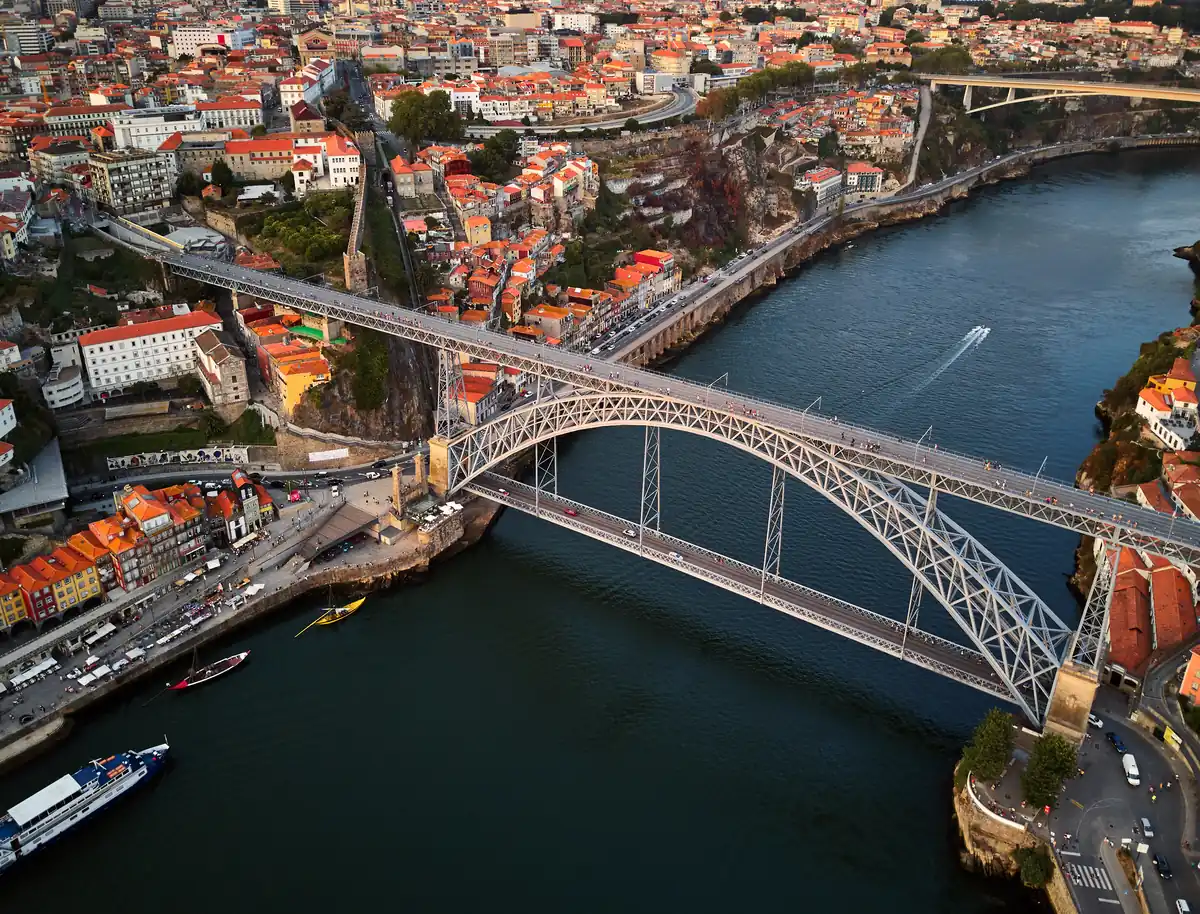 Cross the Dom Luis I bridge in Porto