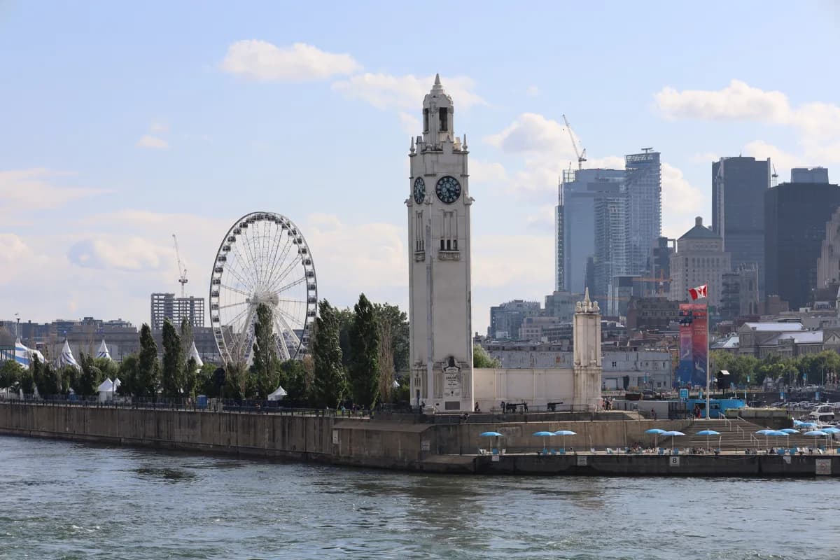 The Old Port clock tower and Grande Roue seen from the river