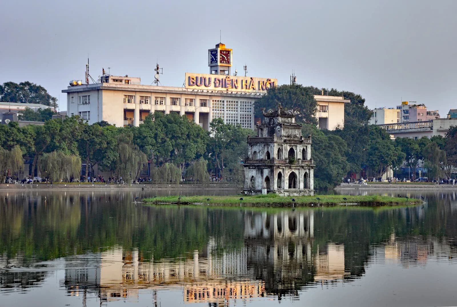 The Turtle Tower reflected in Hoan Kiem Lake, the centre of Hanoi