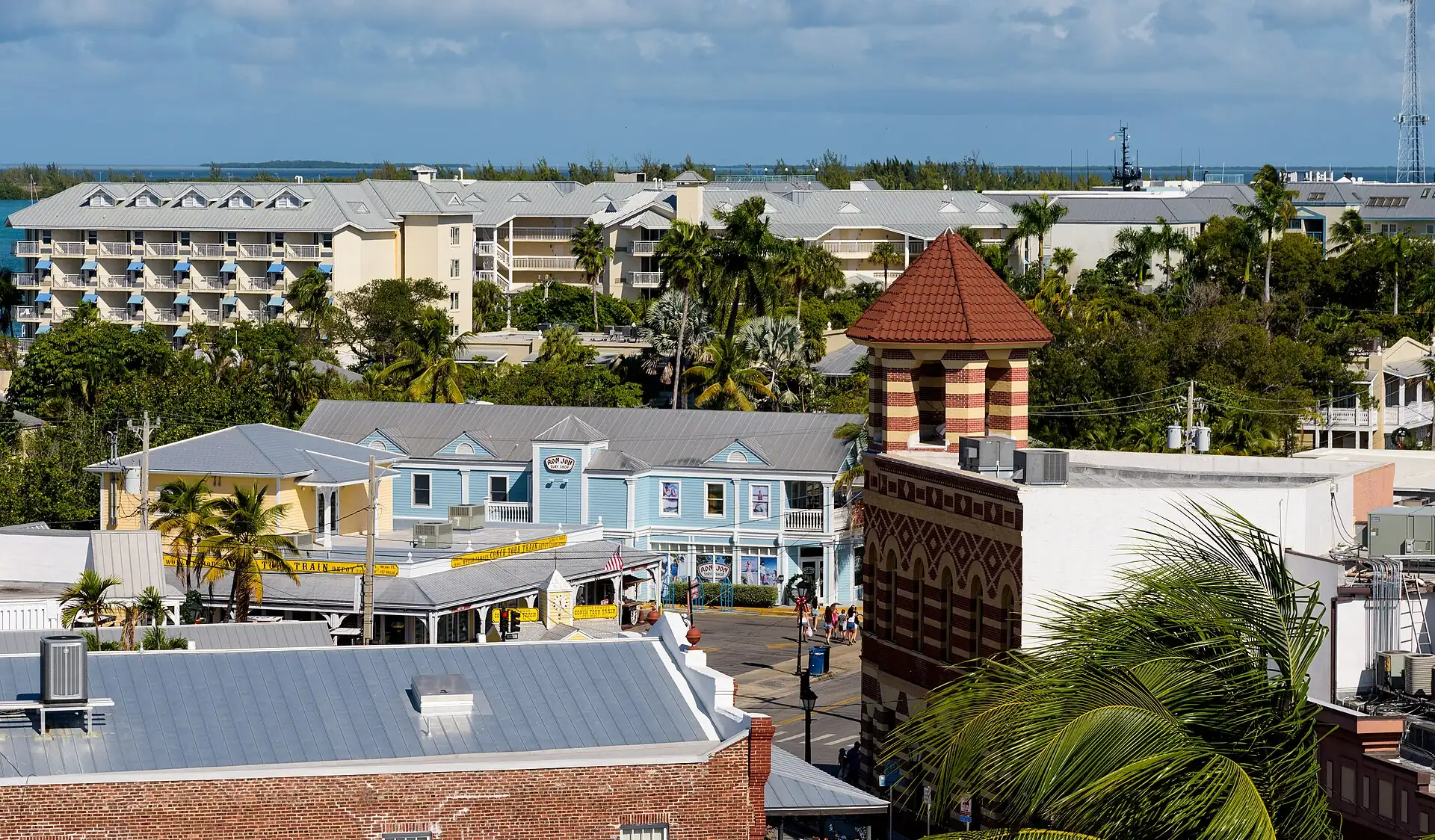 Wooden buildings with balconies on the corner of Front and Duval Street in Key West