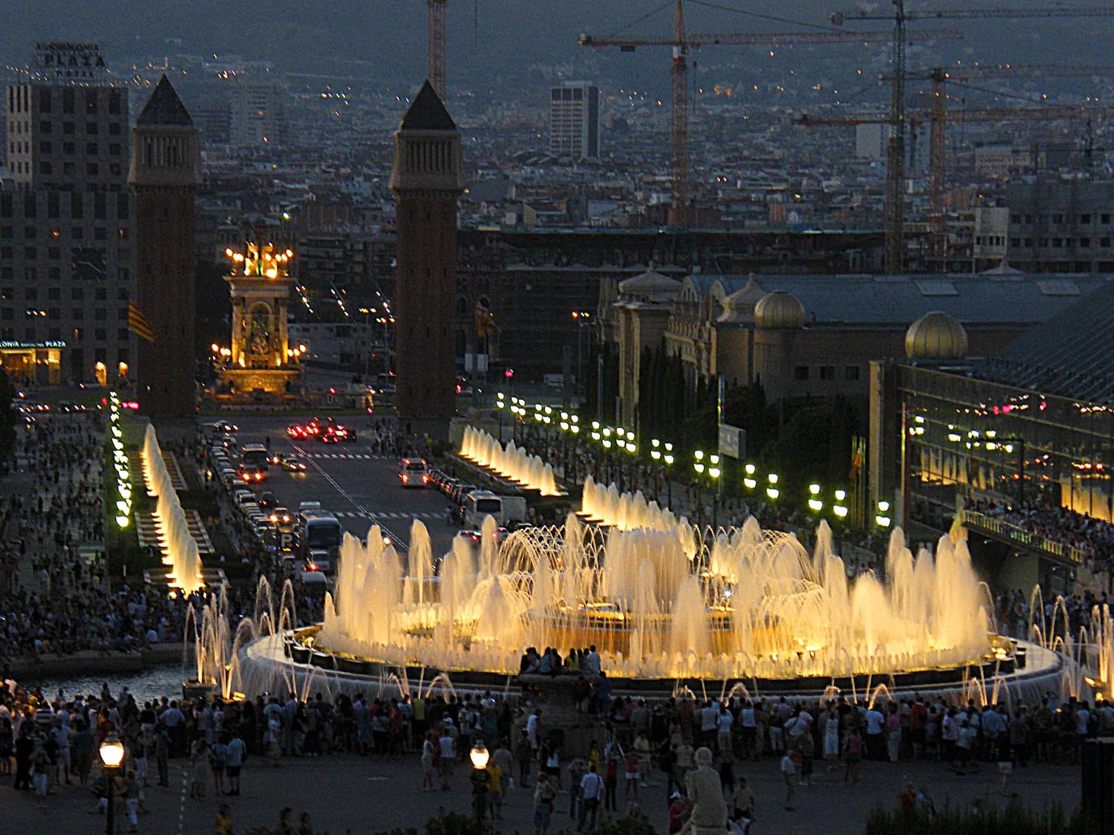 The Magic Fountain of Montjuic lit up below the Palau Nacional