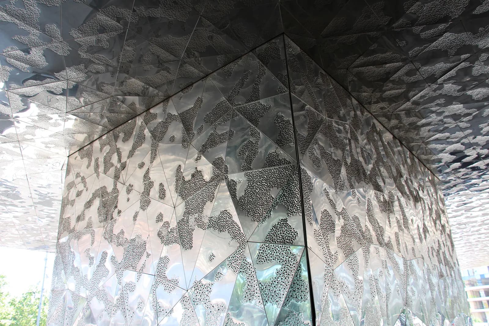 The angular blue building of the Museu Blau natural sciences museum at the Forum