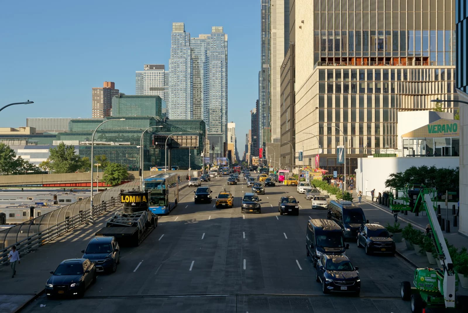 The planted walkway of the High Line running above 11th Avenue in Manhattan