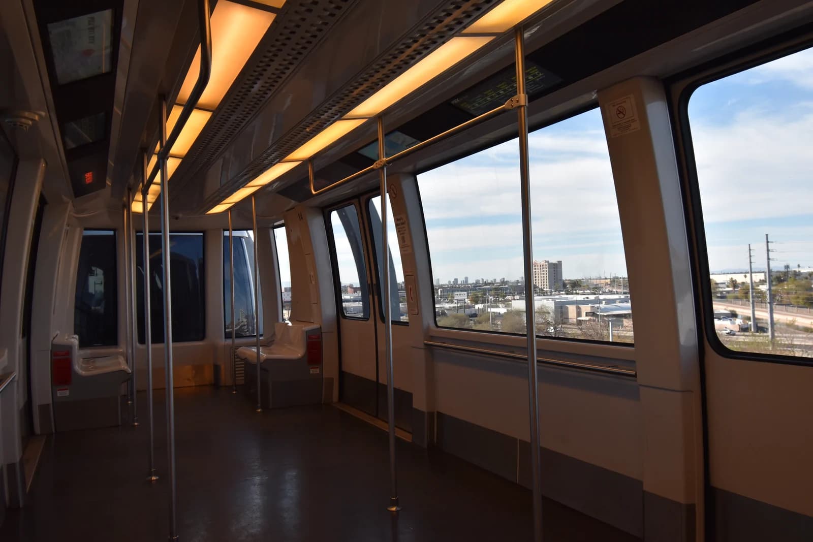 The air-conditioned interior of a PHX Sky Train carriage at Phoenix Sky Harbor