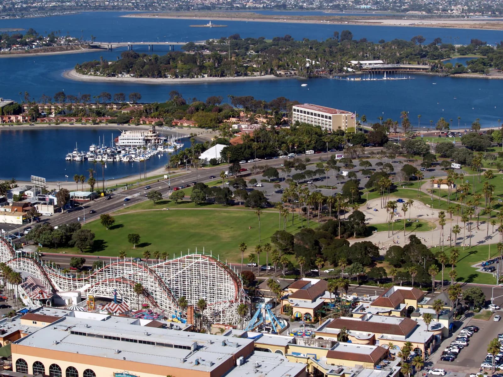 Mission Bay in San Diego from the air, with the wooden roller coaster at Belmont Park in the foreground